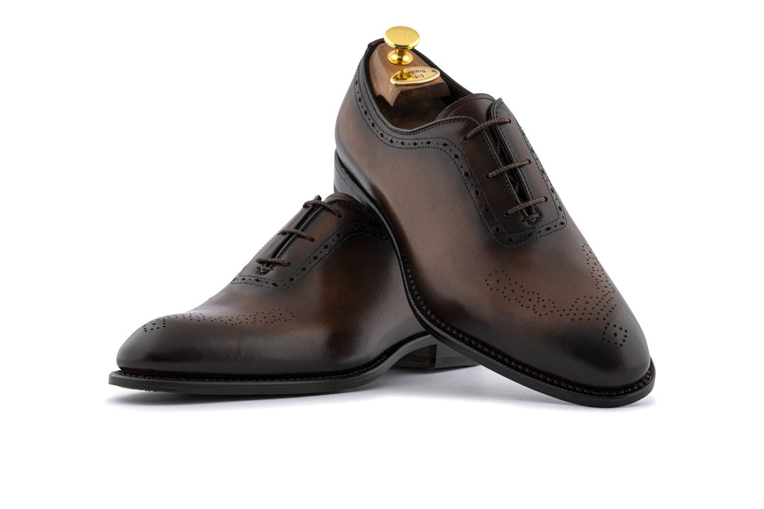 Detalles de cuero francés y brouge