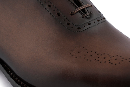 Detalles de cuero francés y brouge