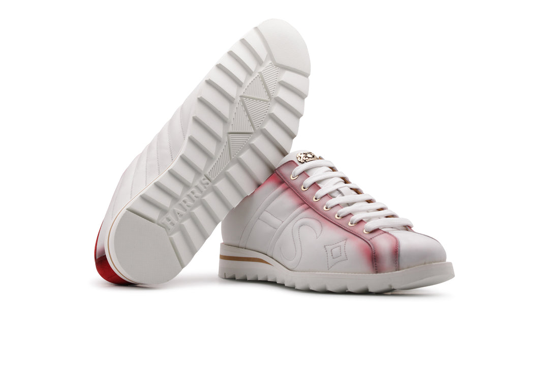 Sneaker de piel y ante decolorados.